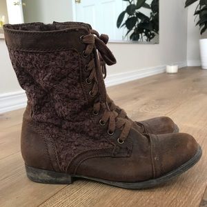 Lace up boots with zippers